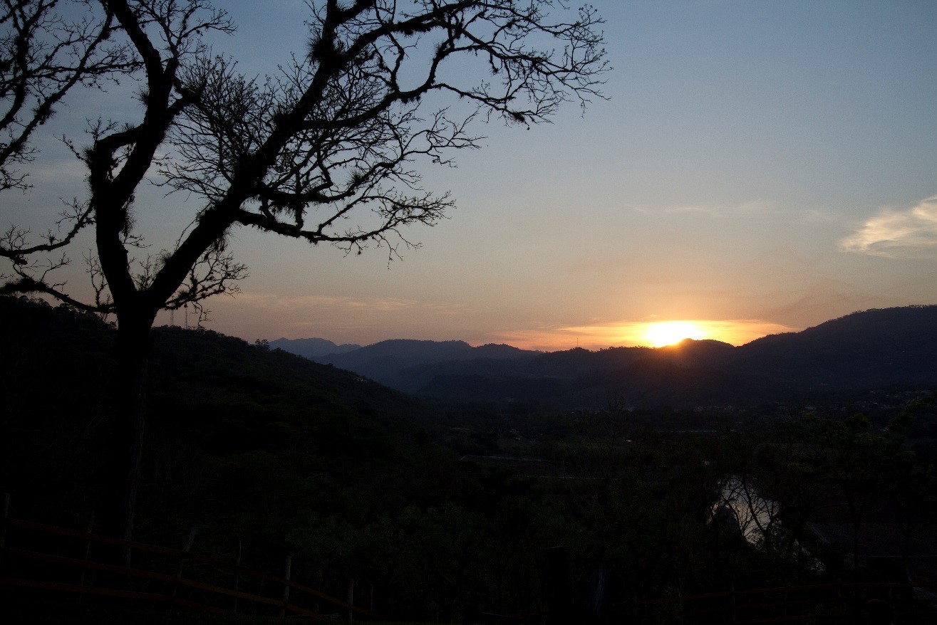 a zoomed out shot of a sunset