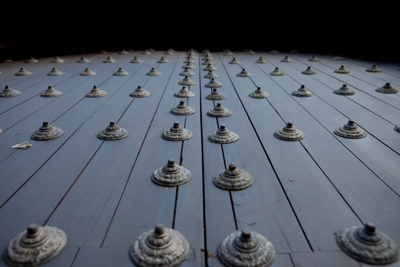 an interesting photo of a door in cusco with a shallow depth of field