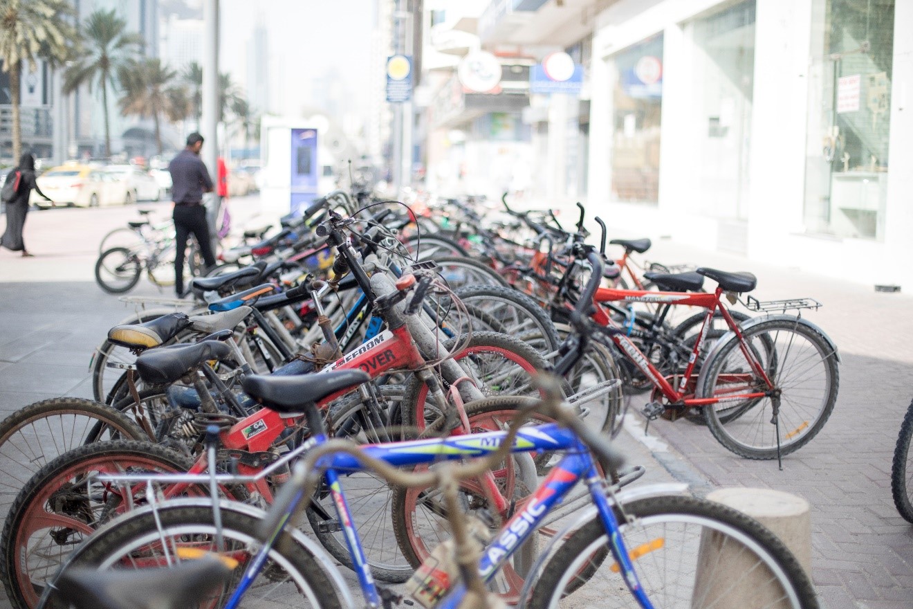 a row of bikes lines the street of dubai