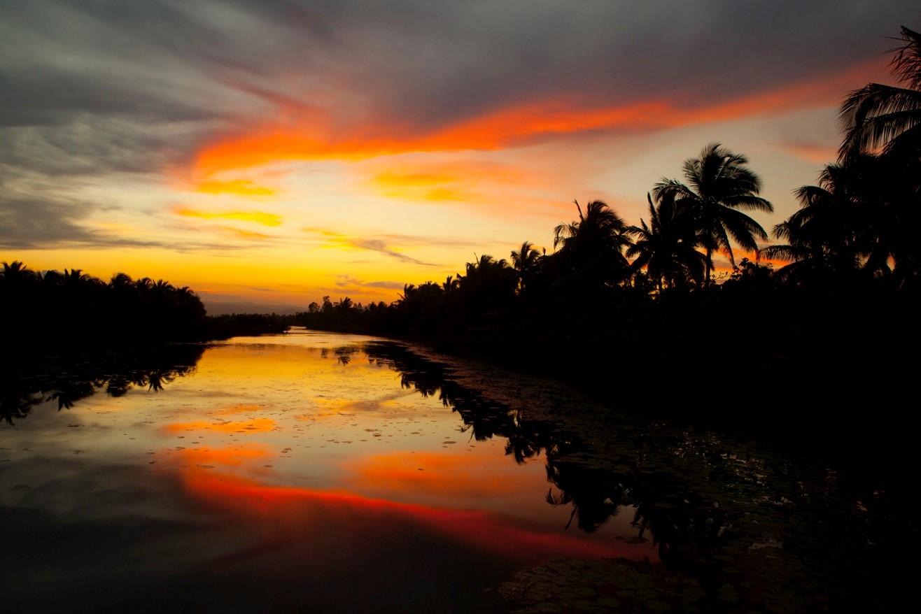 a golden and red sunset over the shores of madagascar