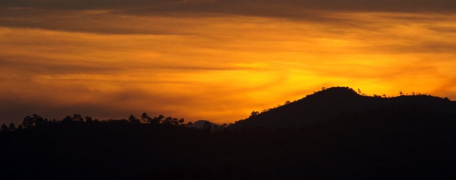 a vibrant orange sunset in Central America