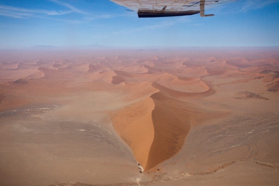 a bird's eye view of Namibia's sand dunes from a small charter flight over the sand dune sea