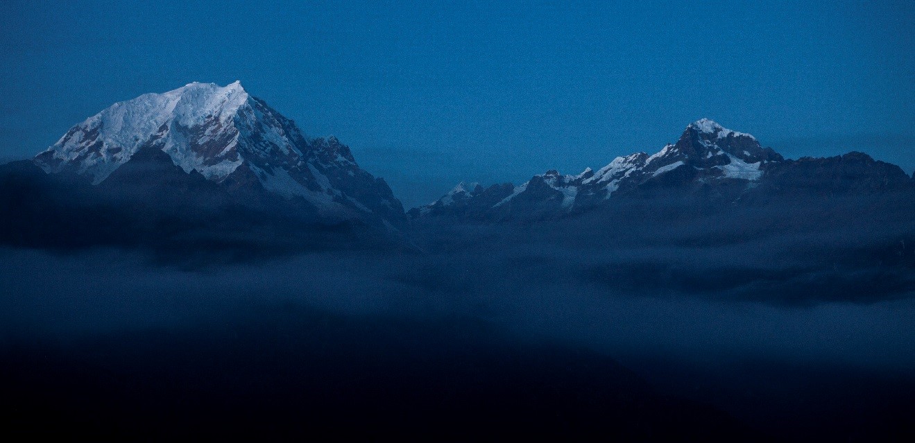 the salkantay range of the andes in early morning blue dawn light