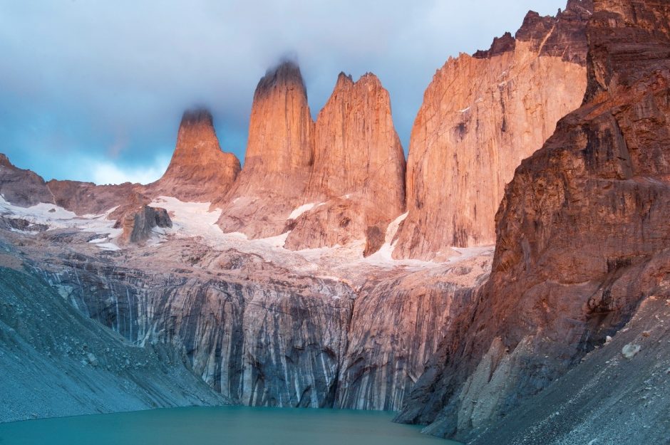 a stunning photo of peaks in patagonia with beautiful light
