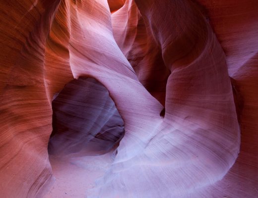 a slot canyon is revealed with stunning colors in the desert southwest of the USA