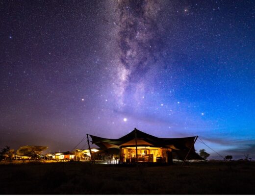 milky way over a camp