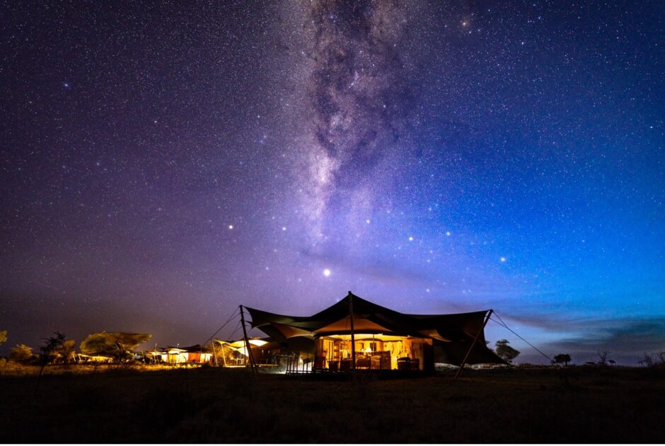 milky way over a camp
